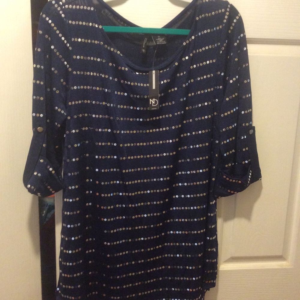 1X, NWT blouse adorned with sequins.
